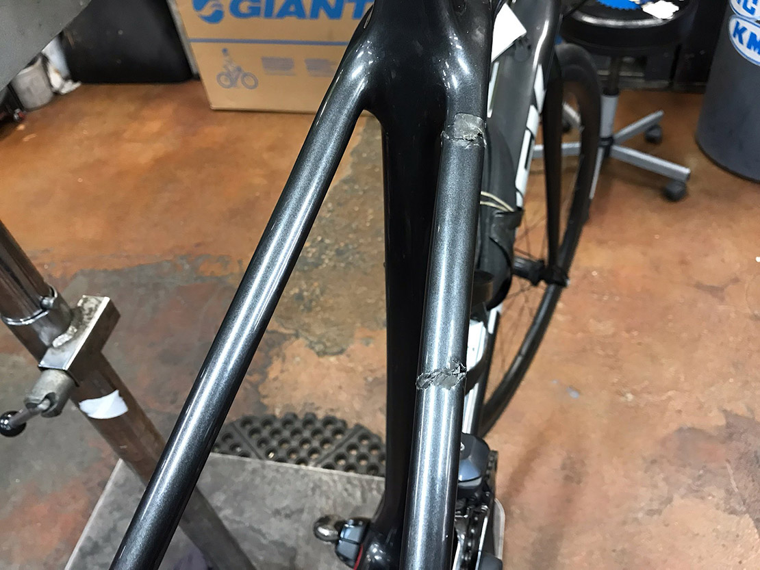 cracked carbon bike frame