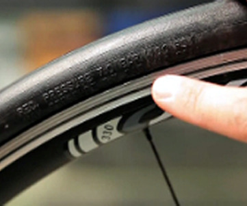 how to inflate bike tire