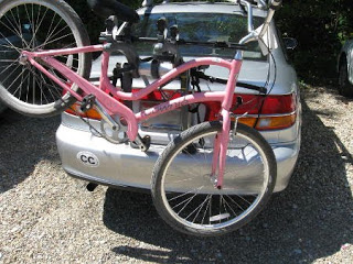 putting bike on bike rack